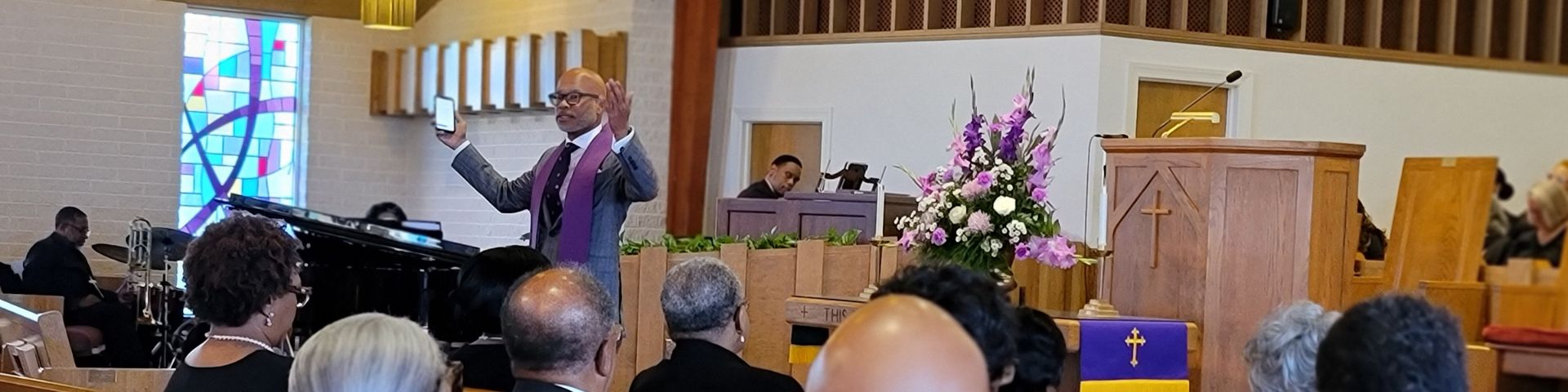Pastor preaching sermon in church