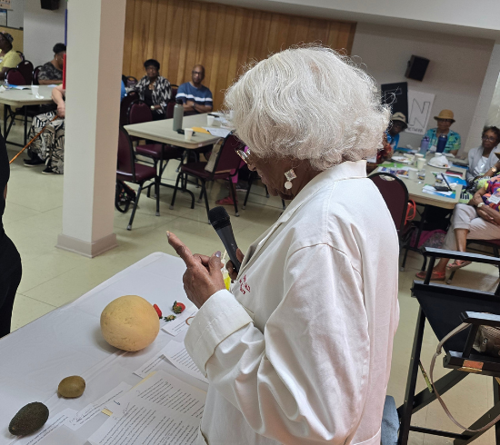 Adult teacher teaching in lab coat